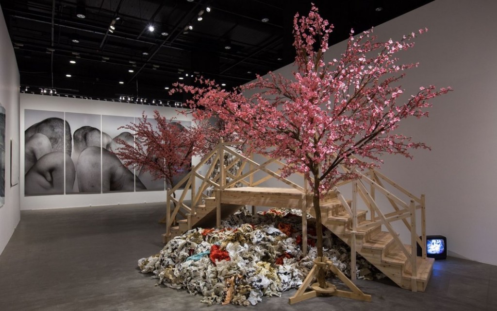 View of “M+ Sigg Collection: Four Decades of Chinese Contemporary Art,” 2016, featuring Calligraphy Peach Blossom Garden (2004) by Yangjiang Group and Chen Zaiyang.